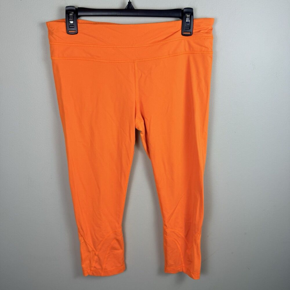 Lululemon Womens Leggings Cropped Orange Size 10 Pockets Zipper